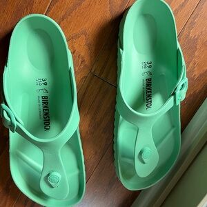 Birkenstock green sandals.